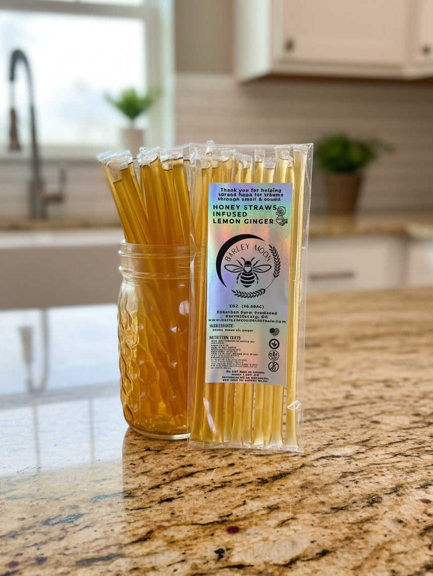 Barley Moon Botanicals Linger Zing lemon ginger honey straws in a glass jar and clear packaging on a kitchen counter.