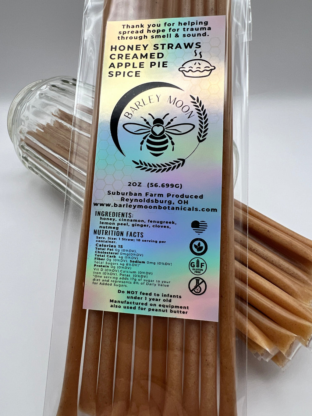 Barley Moon Botanicals Apple Pie Spice creamed honey straws in a clear plastic pack with a holographic label.