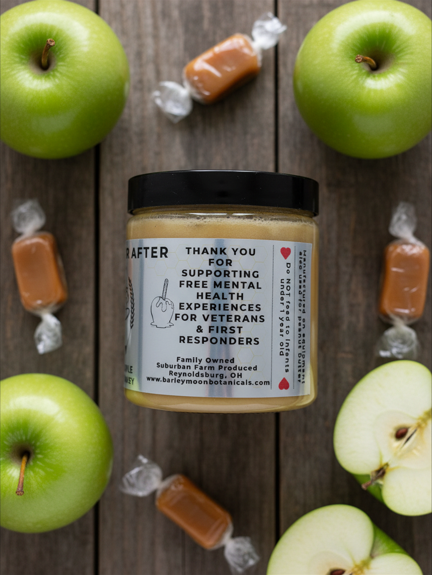 Barley Moon Botanicals Apple-y Ever After creamed honey jar surrounded by fresh green apples and caramel candies