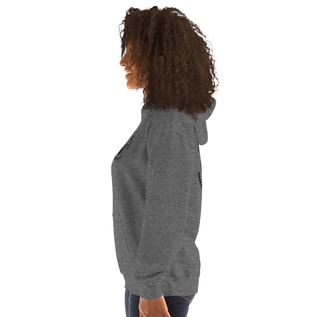 Side view of a woman wearing a dark grey Barley Moon Botanicals unisex hoodie with a bee and moon logo design.
