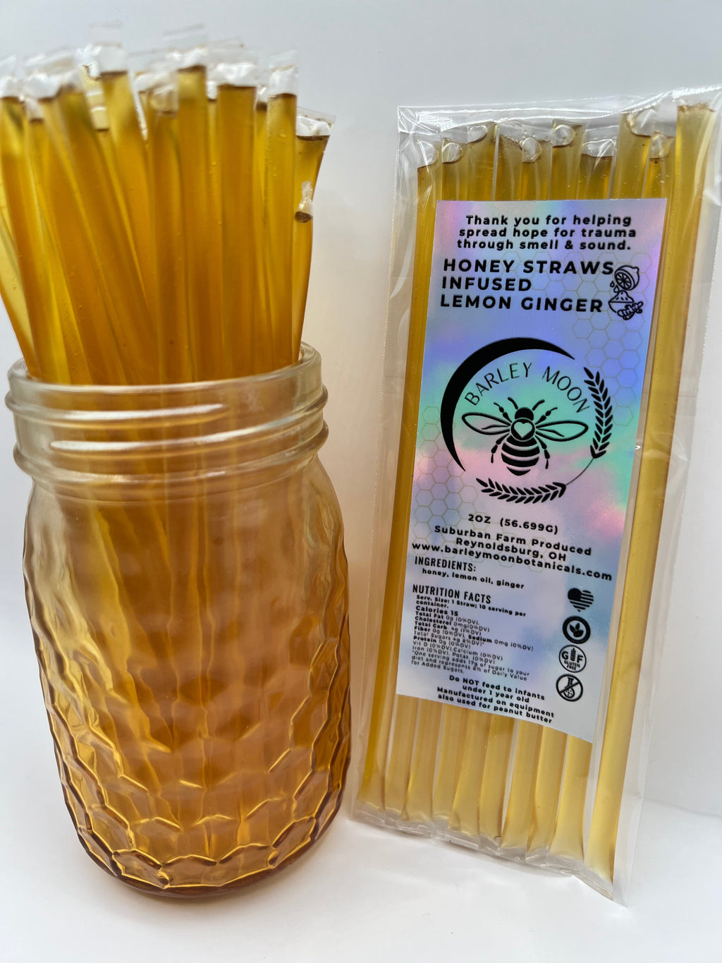 Barley Moon Botanicals Linger Zing lemon ginger honey straws in a glass jar and a sealed retail package.