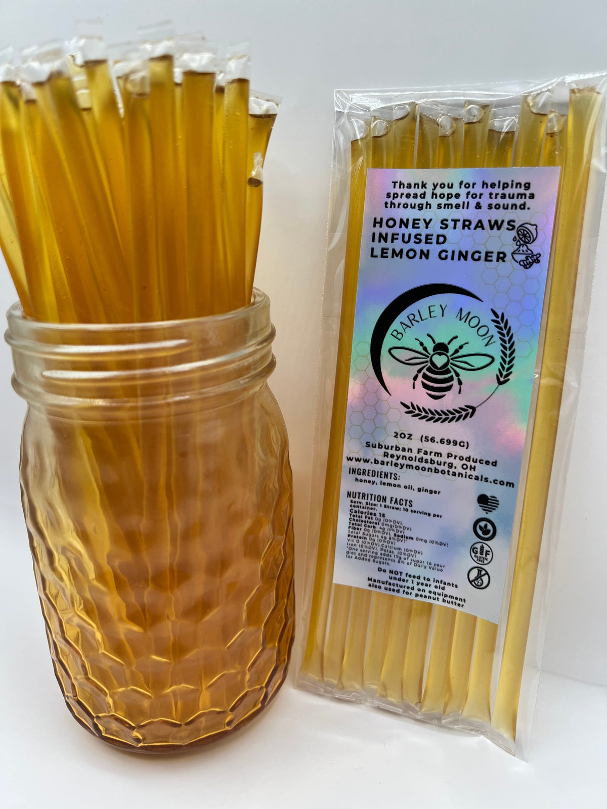 Barley Moon Botanicals Linger Zing lemon ginger honey straws in a glass jar and a sealed retail package.