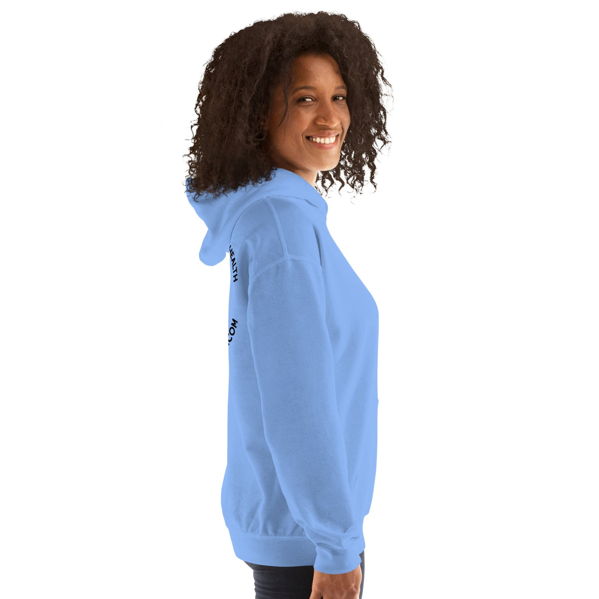 Barley Moon Botanicals light blue unisex hoodie worn by a smiling woman, side profile view showing sleeve text