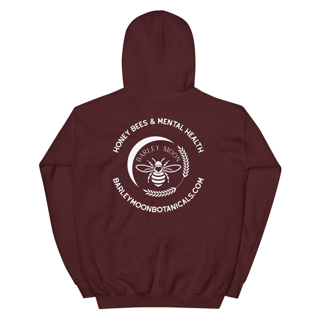Back view of a maroon Barley Moon Botanicals unisex hoodie featuring a white bee and crescent moon logo graphic.