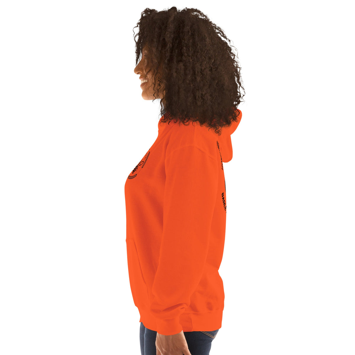 Barley Moon Botanicals unisex orange hoodie with black bee and moon graphic, worn by a woman in profile view.