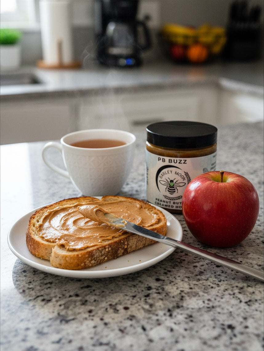 Barley Moon Botanicals PB Buzz peanut butter creamed honey spread on toast with a fresh apple and hot tea