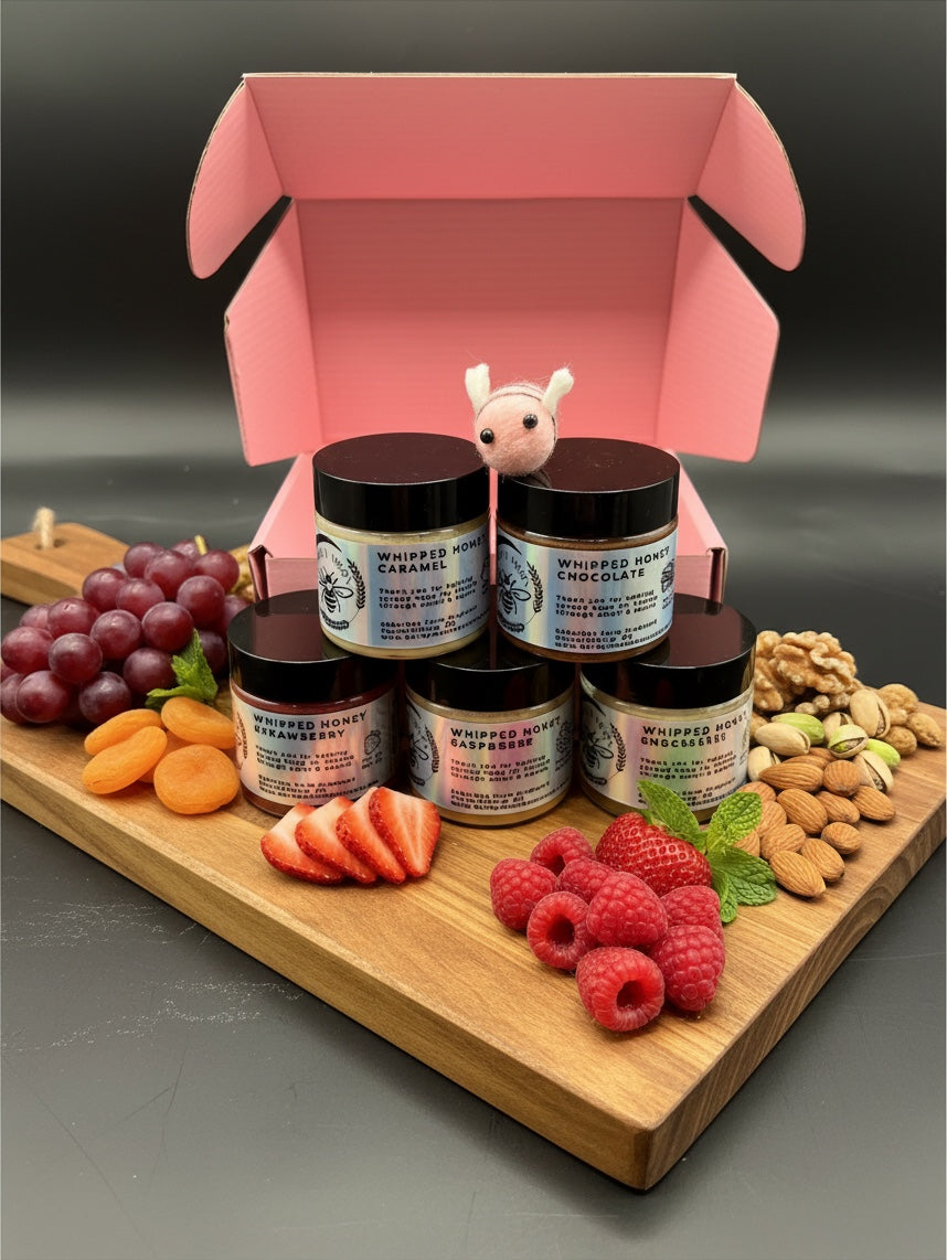 Barley Moon Botanicals Bee Mine whipped honey flight set with five jars, fresh fruit, nuts, and a cute felt bee.